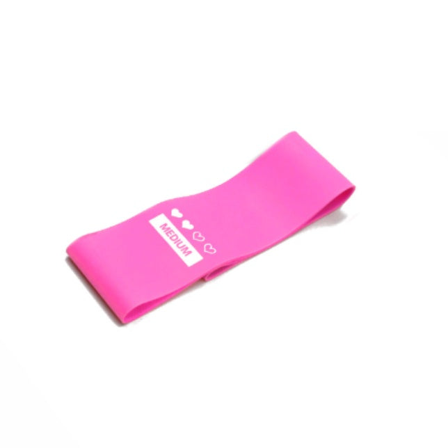 Pink resistance band with a label on a white background
