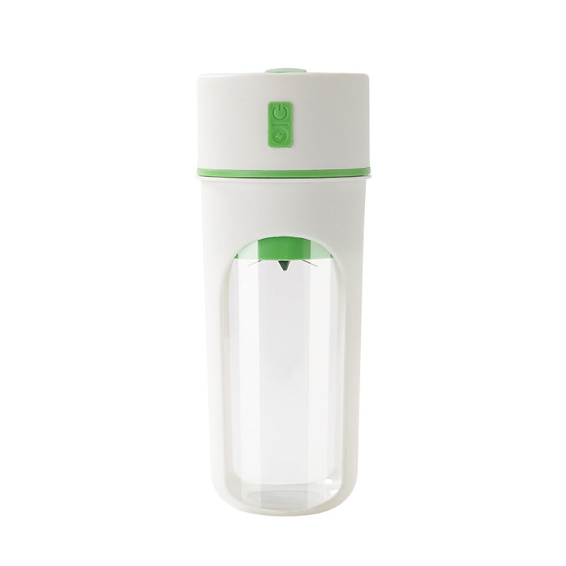Clear glass water bottle with green accents on a white background