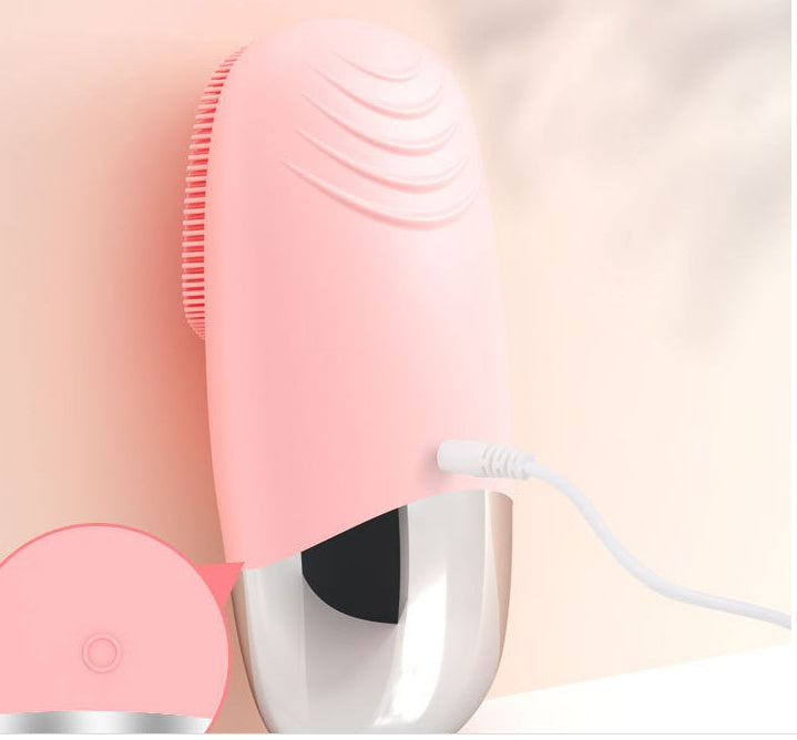 Pink and white hair dryer on a light pink background